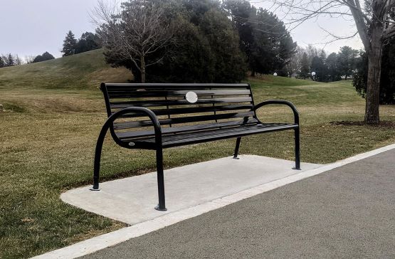 mom and daughter on a park bench